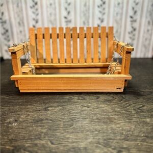 Handmade wooden swing birdfeeder